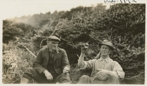Image of Campell and Jot- mother carry's chicken in hand